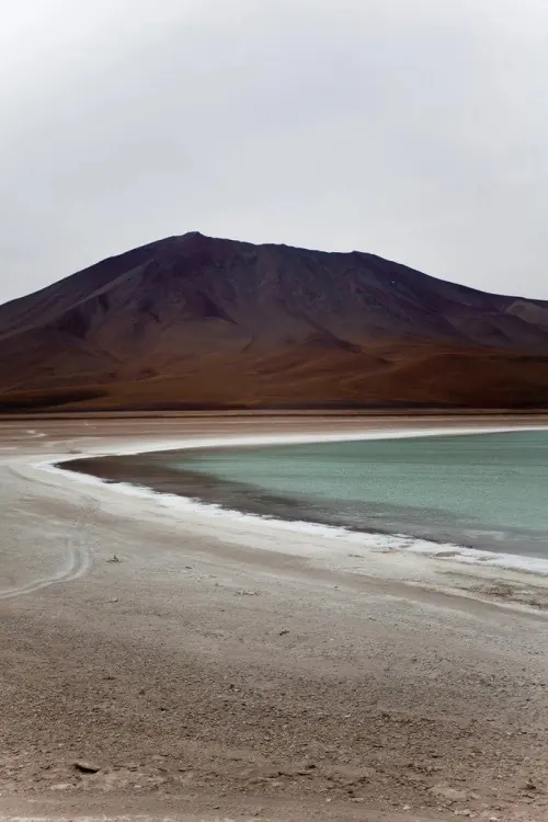 Desert mountain with turquoise salt lake, photographic, cool