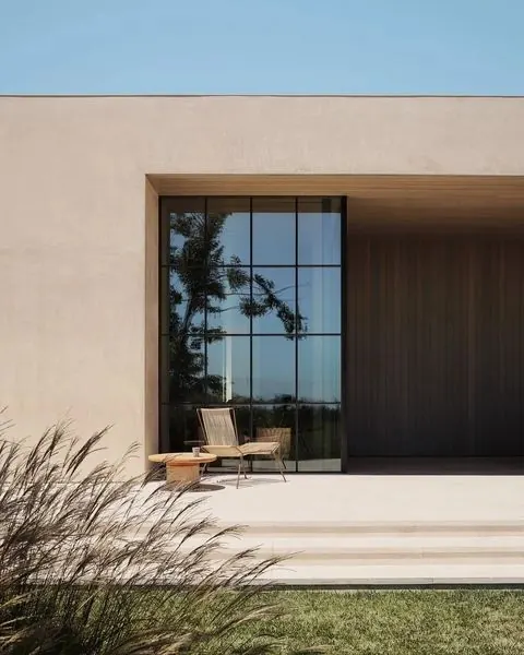Modern minimalist exterior with grid window, minimal, corporate-clean, light