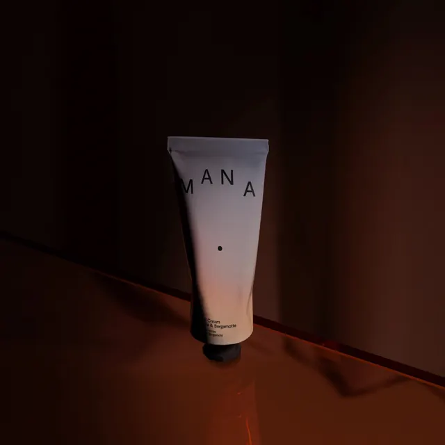 Mana Hotels cosmetics tube, minimal, photographic, warm