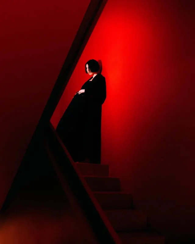 Portrait photography with dramatic lighting, dark-mode, photographic, dark