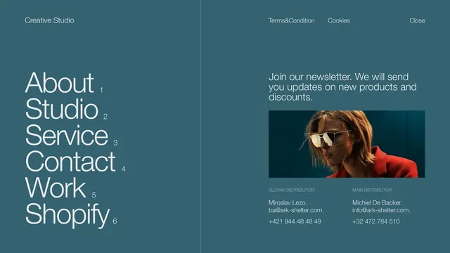 Creative studio website footer section, corporate-clean, minimal, cool