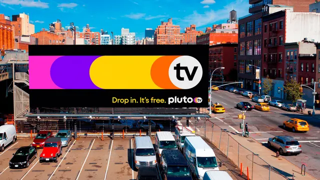 Pluto TV brand identity billboard with colorful logo, graphic, bold, vibrant