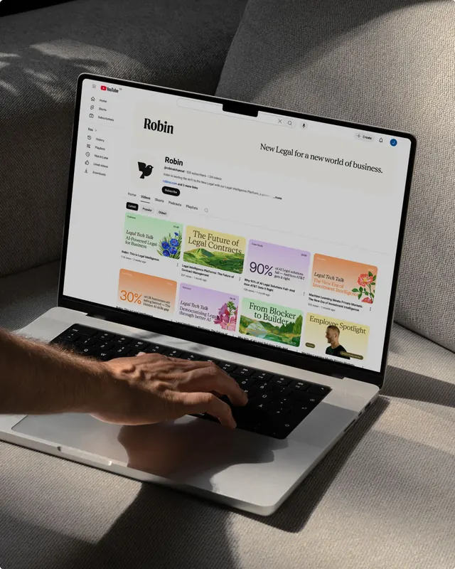 Laptop mockup: legal SaaS dashboard with card grid, minimal, corporate-clean, light