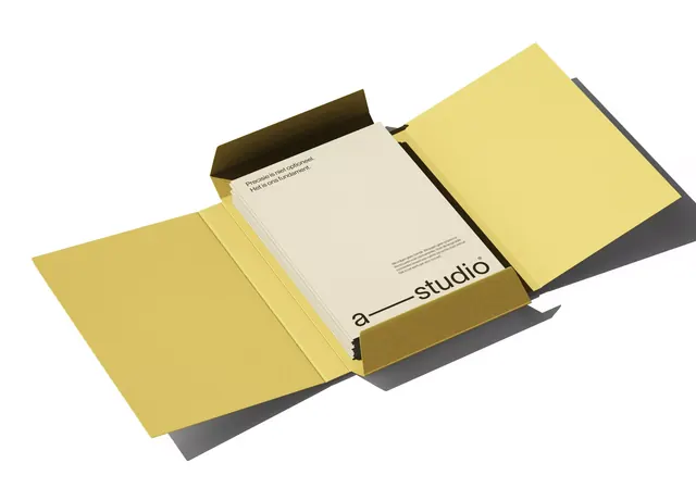 Minimal editorial packaging mockup with warm yellow cardstock, minimal, editorial, light