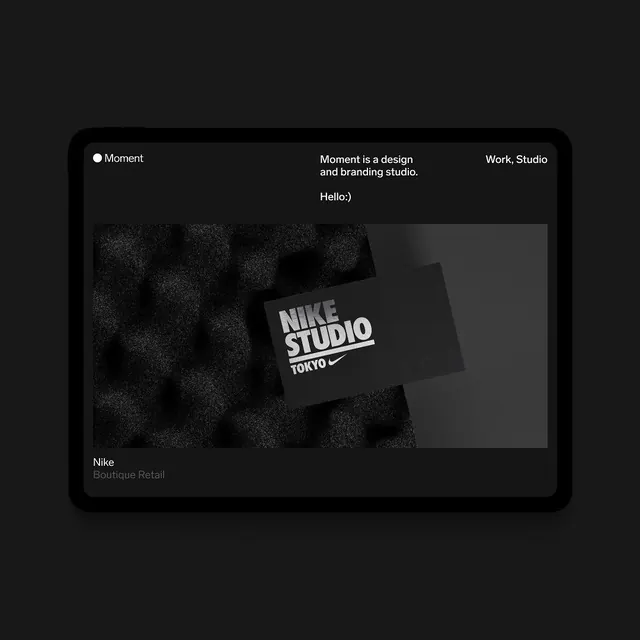 Moment design studio website feature with Nike Studio Tokyo case study, dark-mode, minimal, dark