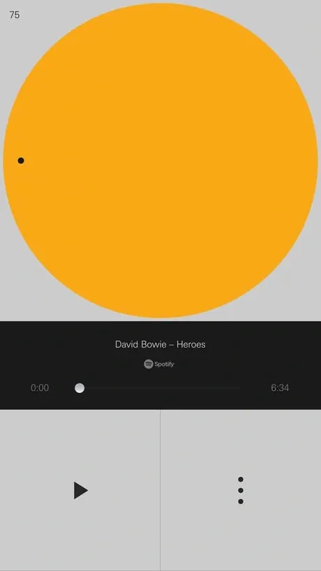 Spotify player UI with golden circle album art, minimal, dark-mode, dark