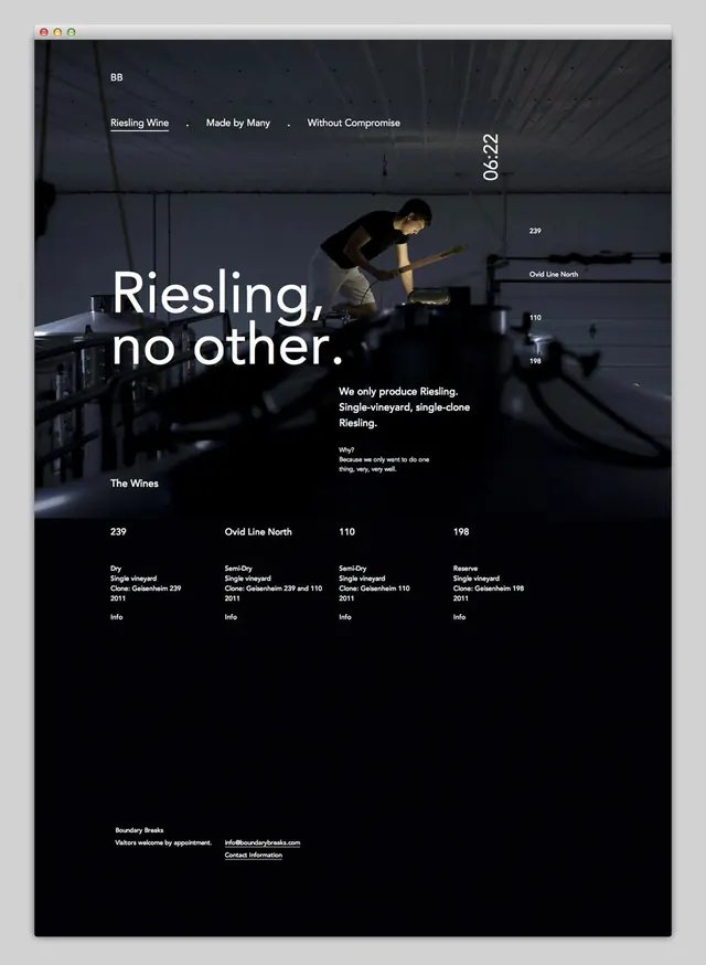 Wine brand website with dark hero and product grid, dark-mode, photographic, dark