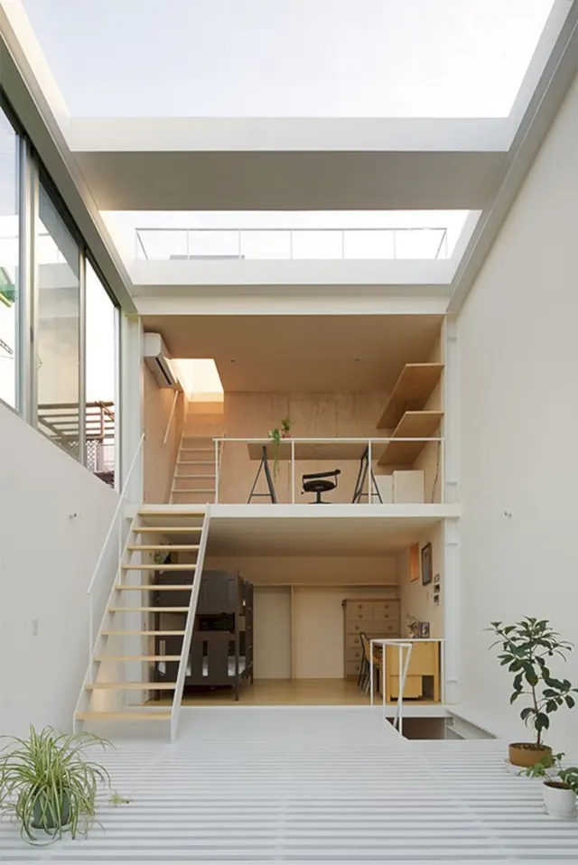 Open-plan modern interior with mezzanine and skylights, architectural, minimal, light