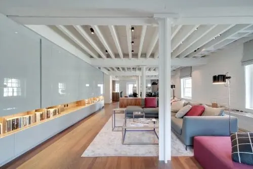 Modern loft space with colorful furniture accents, photographic, minimal, light