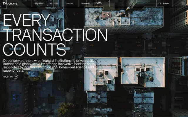 Doconomy aerial city hero, minimal, dark-mode, dark