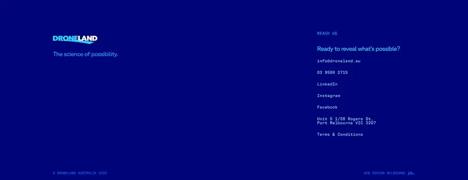 Droneland contact footer, minimal, corporate-clean, dark