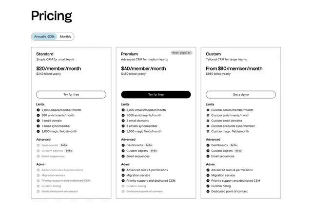 Folk three-column pricing with struck-out features, light-mode, minimal, light