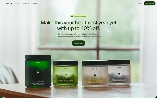 Seed New Year sale hero with product lineup, minimal, light-mode, light