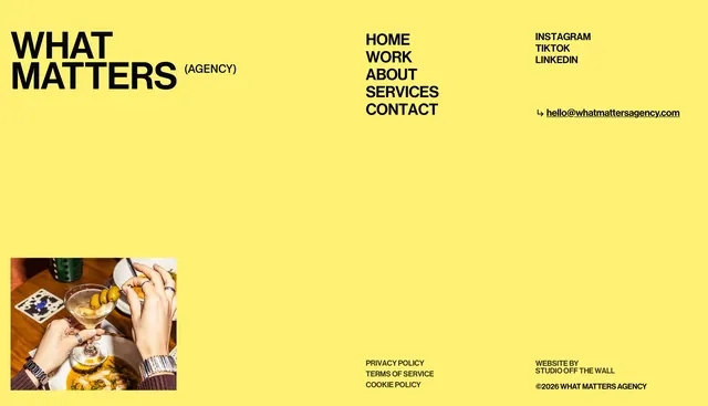 What Matters yellow agency footer, minimal, neo-brutalist, vibrant